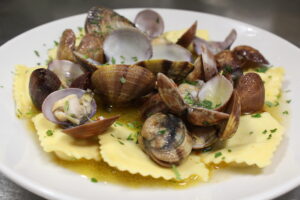 Tortelli alla Ricciola in sautè di Vongole